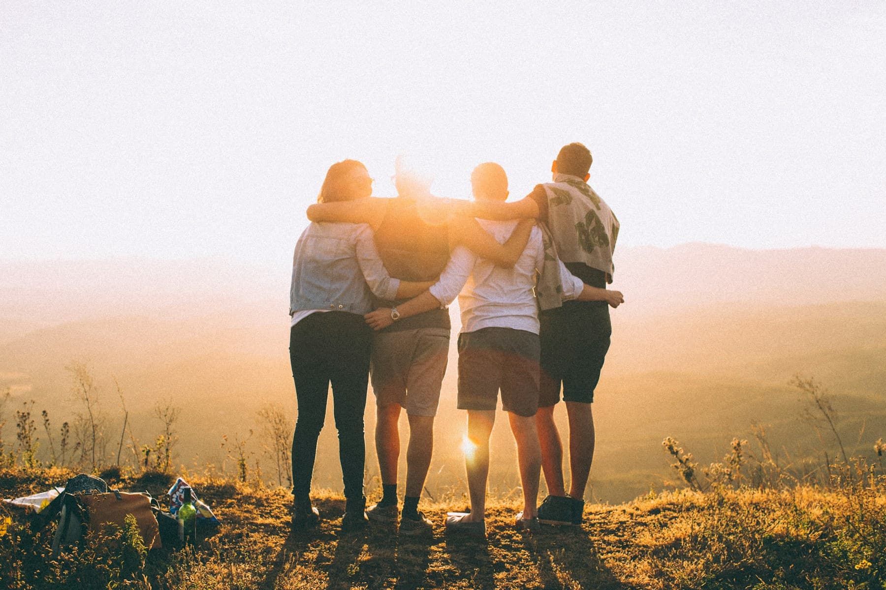 Friends talking together at an evening gathering